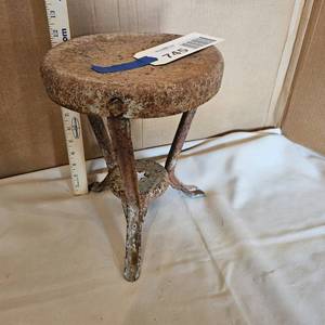 lot 745 image: Antique metal milking stool, weathered
