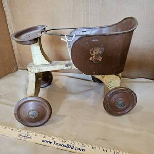 lot 749 image: Antique Toy Turner TinMetal Baby Scooter, 4-wheels