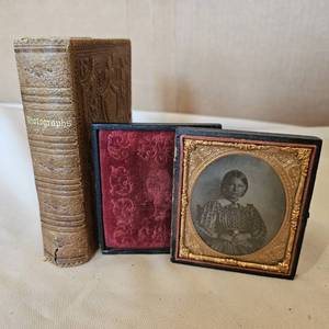 lot 768 image: Antique album with tintype photos, 1 Framed Image Wood case with gold leaf