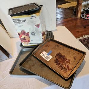lot 869 image: Oster sausage maker and assorted pans