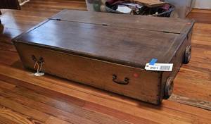 lot 891 image: Antique Rolling Under Bed Trunk, wood