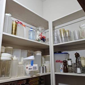 lot 894 image: Plastic food containers, salt and peppers, drinking glasses