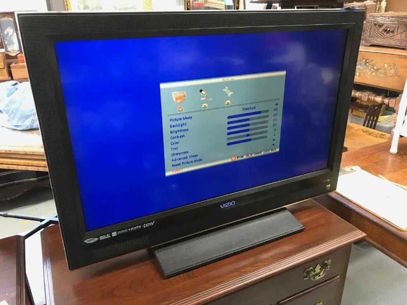 lot 65 image: Vizio TV 1080P HD Model VOJ320F1A