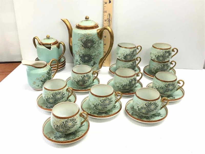 lot 115 image: Egg Shell Porcelain Tea Set (a light bright blue with black painted chrysanthemum)