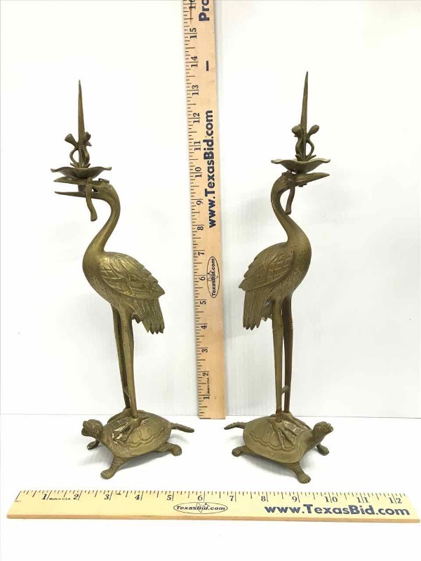 lot 129 image: Brass Crains Standing On Turtles Candle Stands
