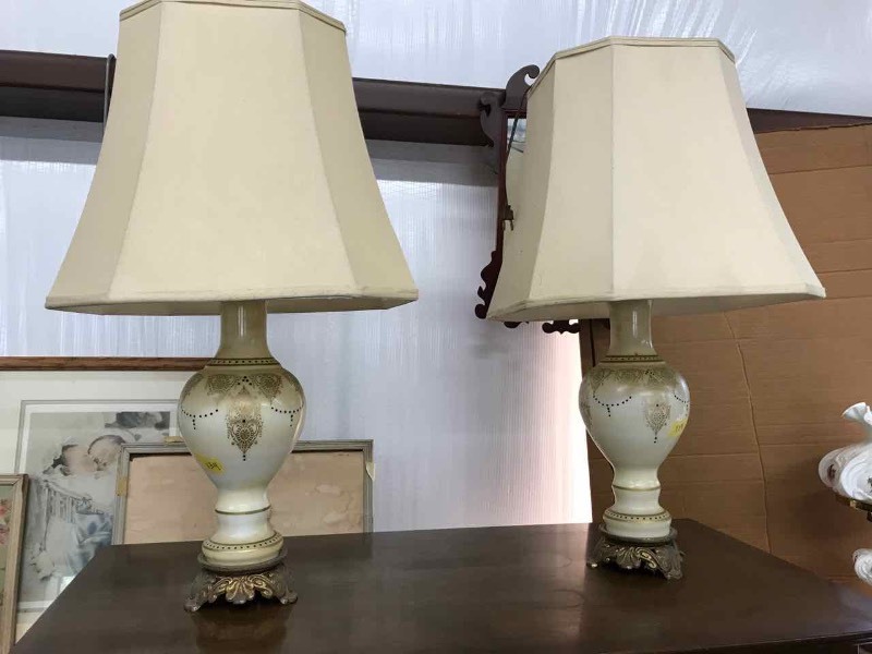 lot 134 image: (2) Lamps White Glass with Black & Gold Painted Design