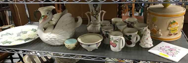 lot 153 image: Poppytrail Cookie Jar (gingerbread boy, girl, dog), Asst. Cups, Magnolia Plate, Swan, Vase, Etc.