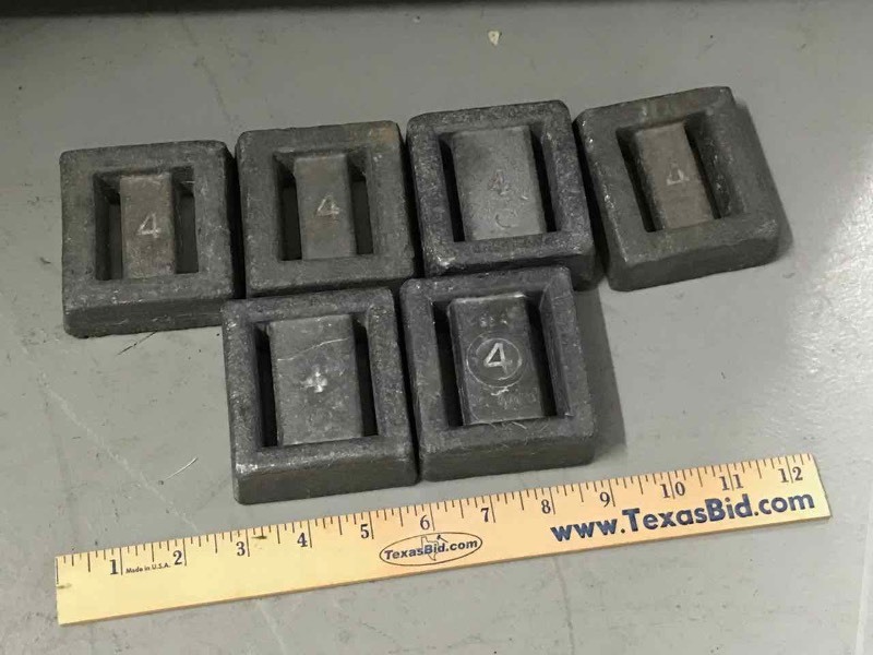 lot 165 image: (6) Divers lead weights, labeled 4 on each one.