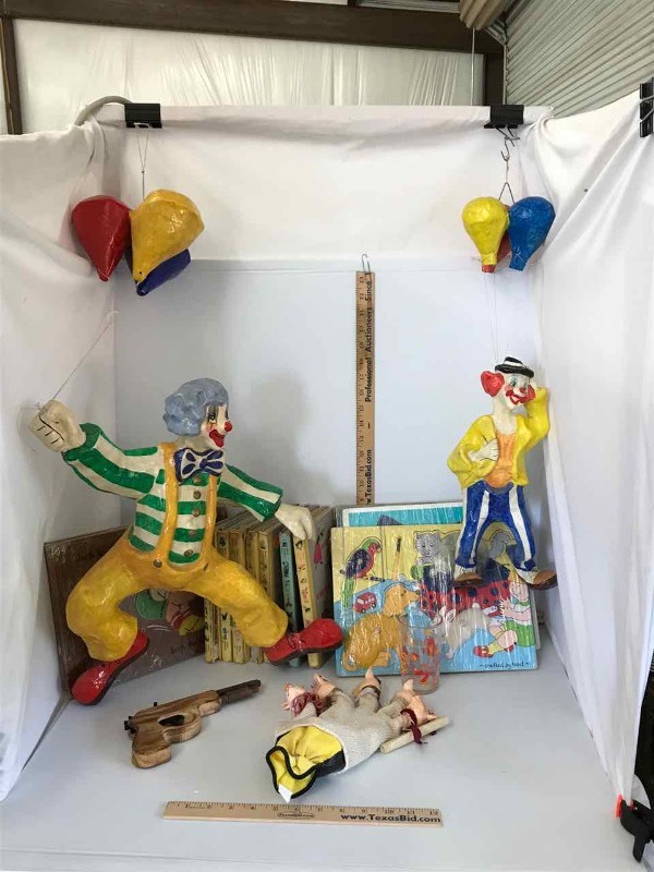 lot 381 image: Vintage Kids Books, Wood Puzzles, Piggy Glove, Wood Toy Pistol, Hot Dog Glass, Silly Paper Mache Clowns