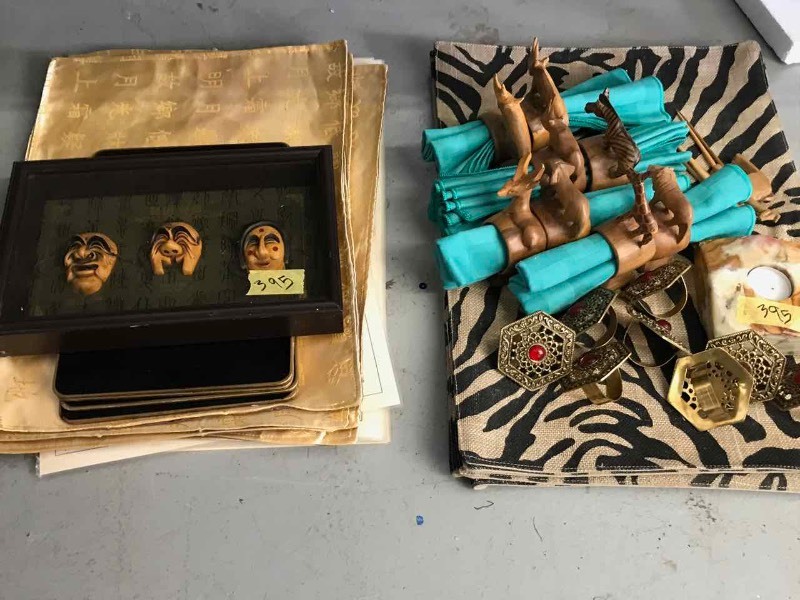 lot 395 image: Asst. Place Mats, Napkin Rings, Stone Candle Holder, Framed Faces