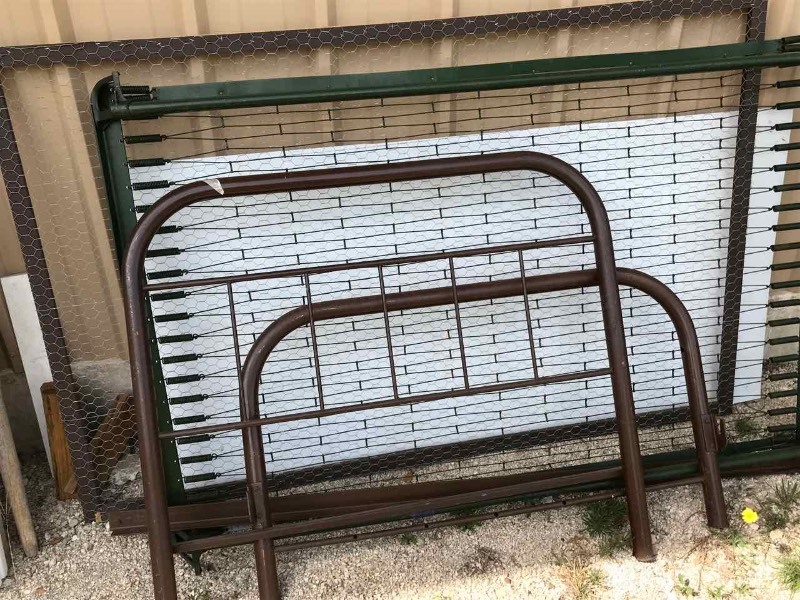 lot 409 image: Iron tubular bed and springs, full size