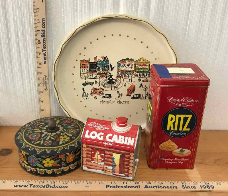 lot 42 image: Tins Ritz Cracker, Log Cabin Syrup, Round Sweets, Tray