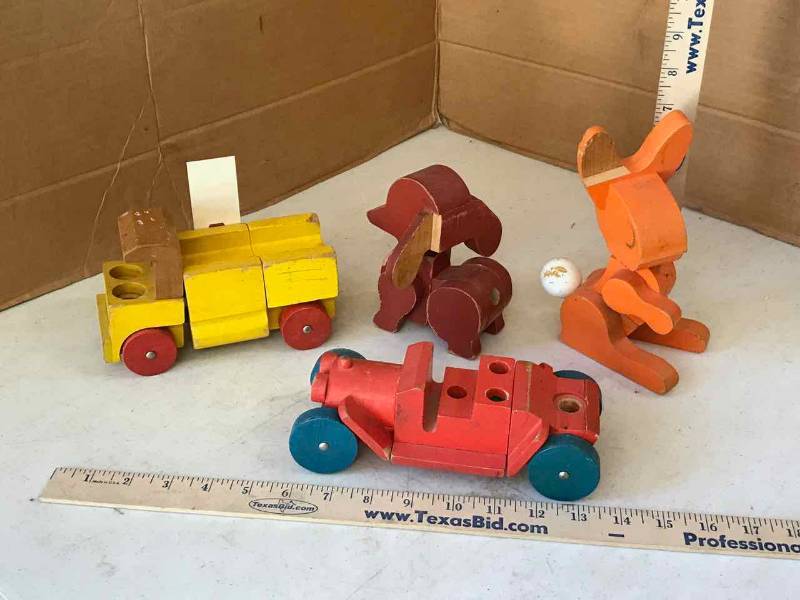 lot 54 image: Old Wood Toys Dog, Bunny, Trucks (some repairreplace parts)