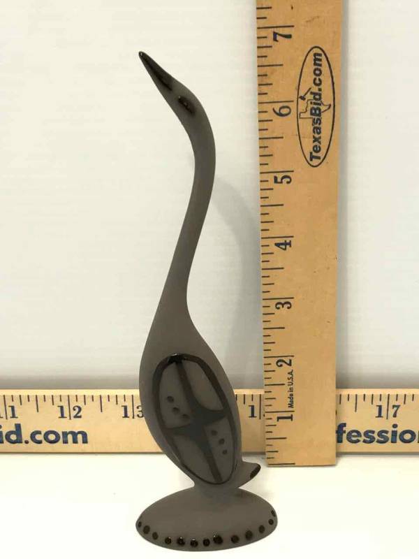 lot 82 image: Art Piece  Gray Clay Swan, glossy black on matte gray, signed on bottom