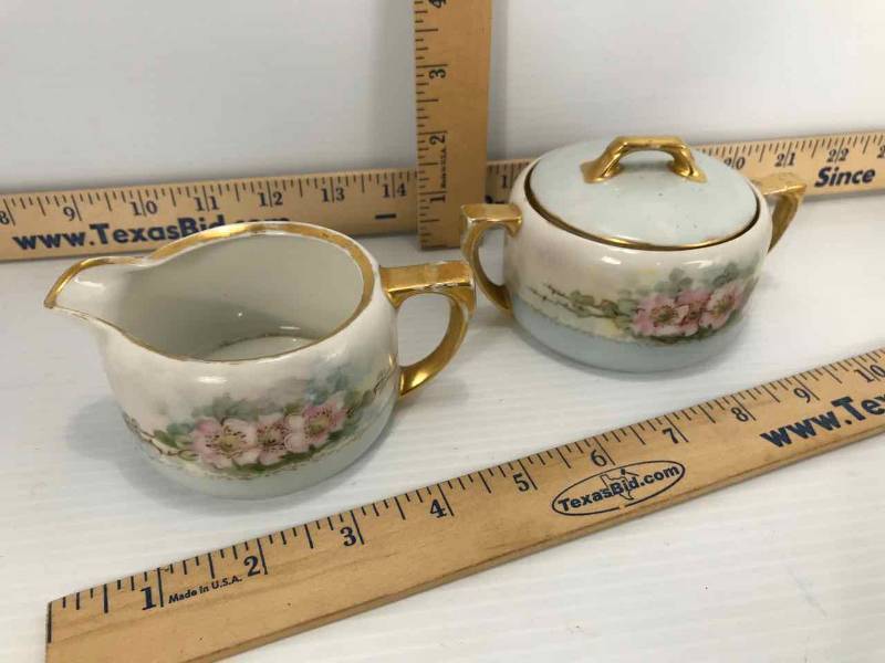 lot 146 image: Creamer & Handled Sugar Bowl, Painted Porcelain (Germany)