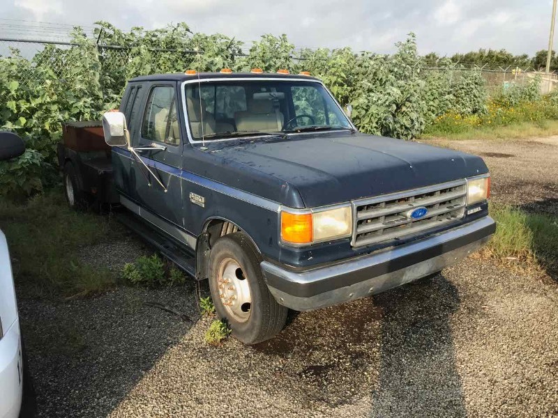 lot 38 image: Forfeiture  1991 Ford F-350 Flatbed Truck,  (VIN  1FTJX35M6MKA93811)