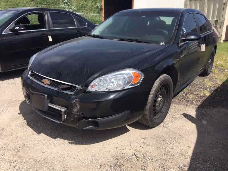 lot 31 image: 2016 Chevrolet Impala 4-door Sedan, Police Vehicle,  40,355. (VIN  2G1WD5E35G1145959)  Harvey Flood Vehicle