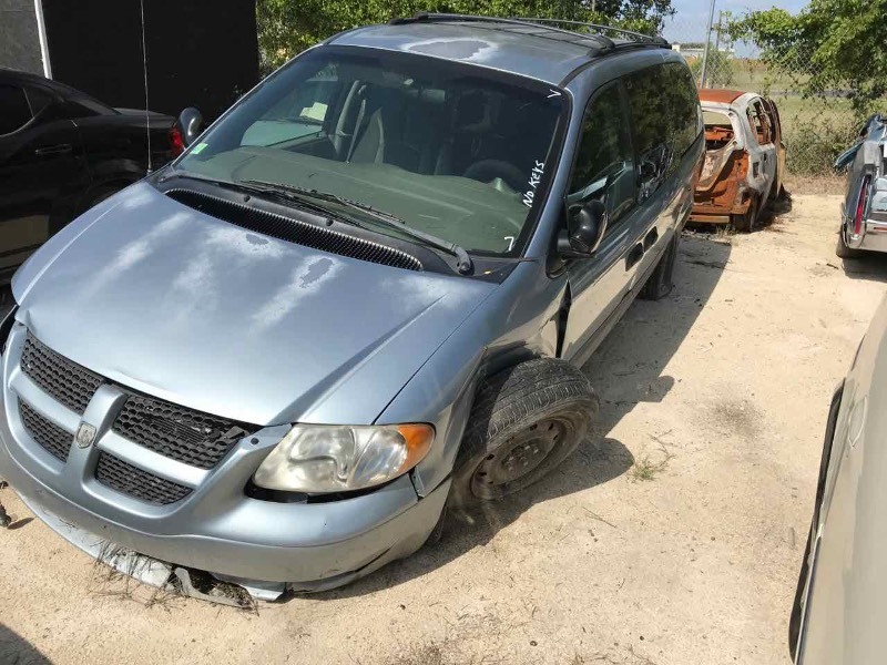 lot 7 image: Storgae Lien Wrecked 2003 Dodge Van (Blue)(1D4GP24323B205437)