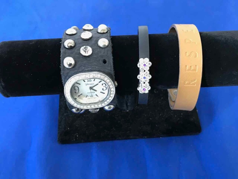 lot 129 image: Leather Band Wrist Watch, Leather Snap Band Respect Bracelet, Rubber Rhinestone Flower Trio Bracelet