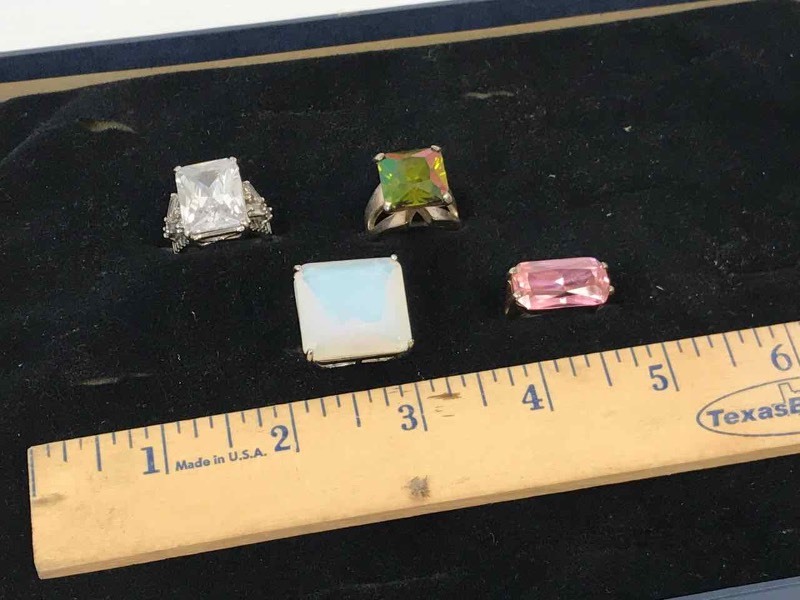 lot 146 image: (4) Rings Green 7, Pink 6, Milky Square 6-12, Clear 8-14