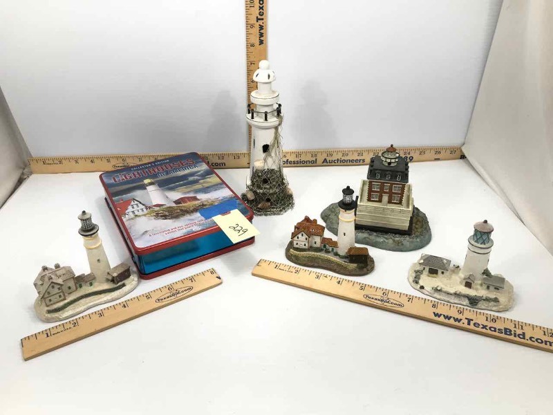 lot 229 image: Lighthouses Tin with 4 DVDs & 1 CD, Figurines