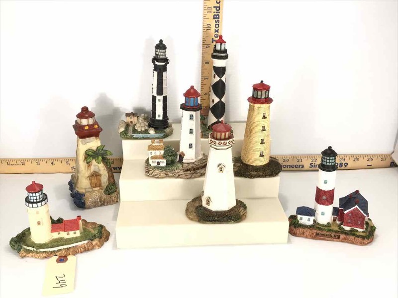 lot 249 image: (8) Lighthouse Figurines (plastic)