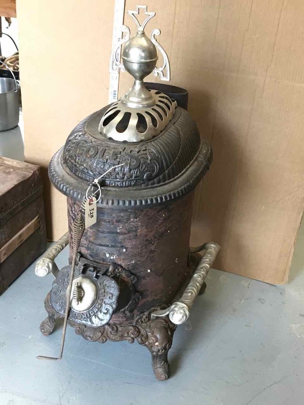 lot 328 image: Antique Coles Parlor Heater with Nickle Fenders & Topper