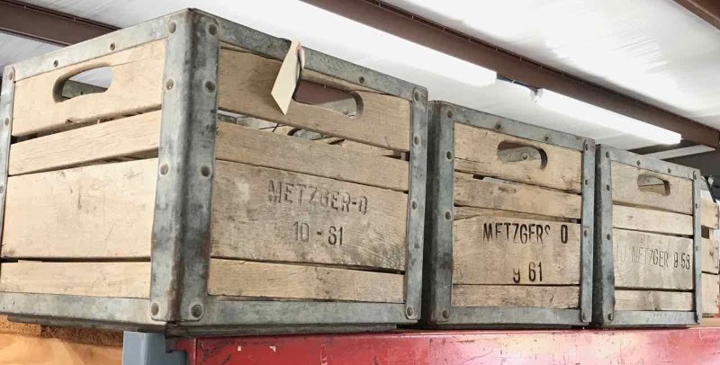lot 382 image: (3) Antique Metzger Wood & Metal Dairy Crates