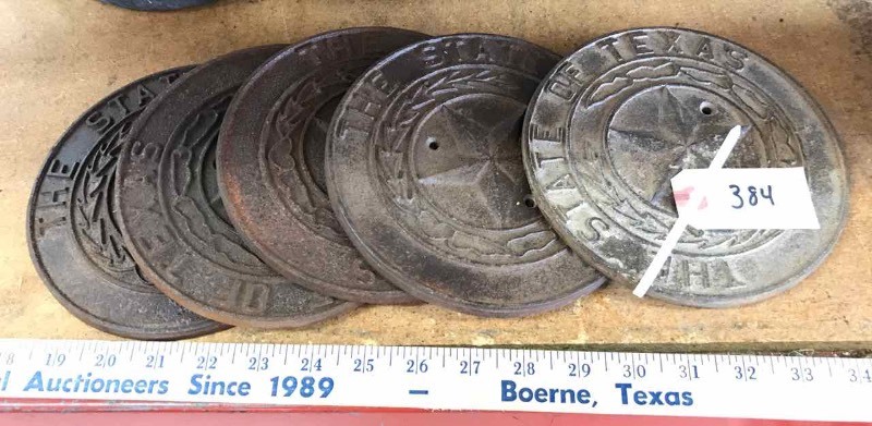 lot 384 image: (5) Cast Iron State of Texas Seals (not old)