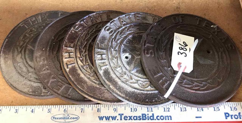 lot 386 image: (5) Cast Iron State of Texas Seals (not old)