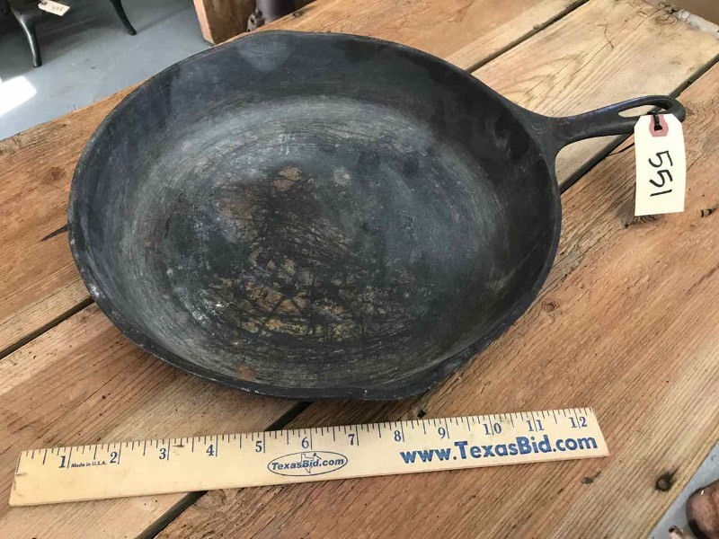 lot 551 image: Cast Iron Griswold Skillet