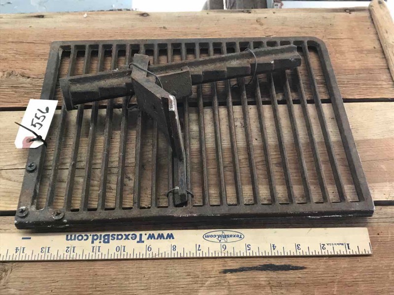 lot 556 image: Cast Iron Grate for girilling on a fireplace