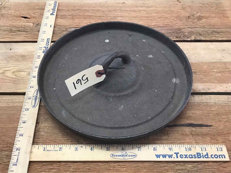lot 561 image: Cast Iron Cracked Lid