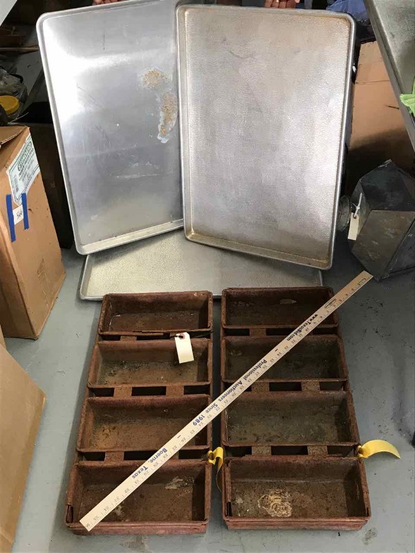 lot 567 image: Old Rusted Bread Pans, Aluminum Cookie Sheets