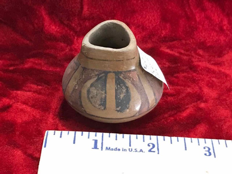lot 594 image: Painted Clay Pot (black and tan)