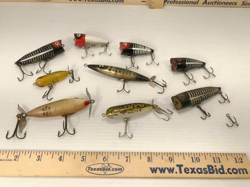 lot 676 image: (9) Heddon Lures Torpedo, Tiny Torpedo, Flying Flutter, (2) Chugger Spooks, Wounded Spook, (3) Chugger Jr.