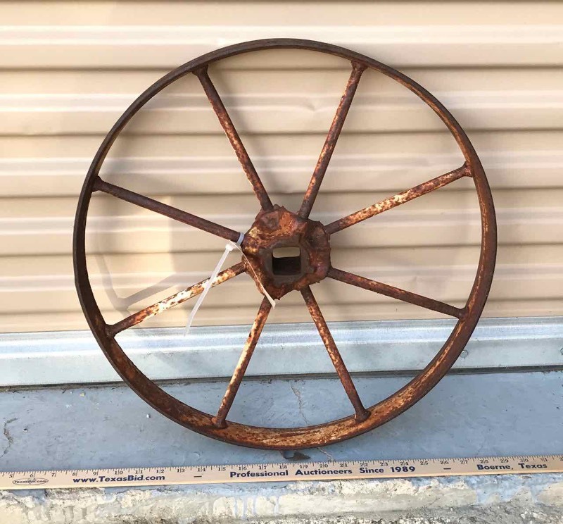 lot 702 image: Iron Implement Wheel (Apprx. 20 inch diameter)