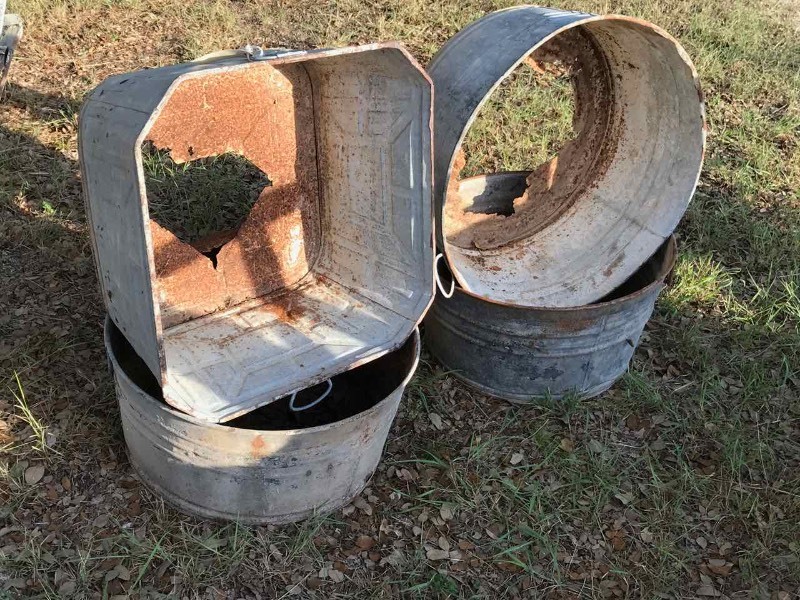 lot 711 image: (4) Old & Rusted Galvanized TubsPlanters (rusted through bottoms)