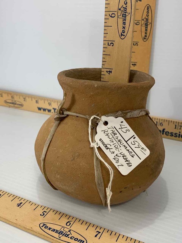 lot 73 image: Tarahumara Rawhide Wrapped Clay Pot (Made in Mexico)