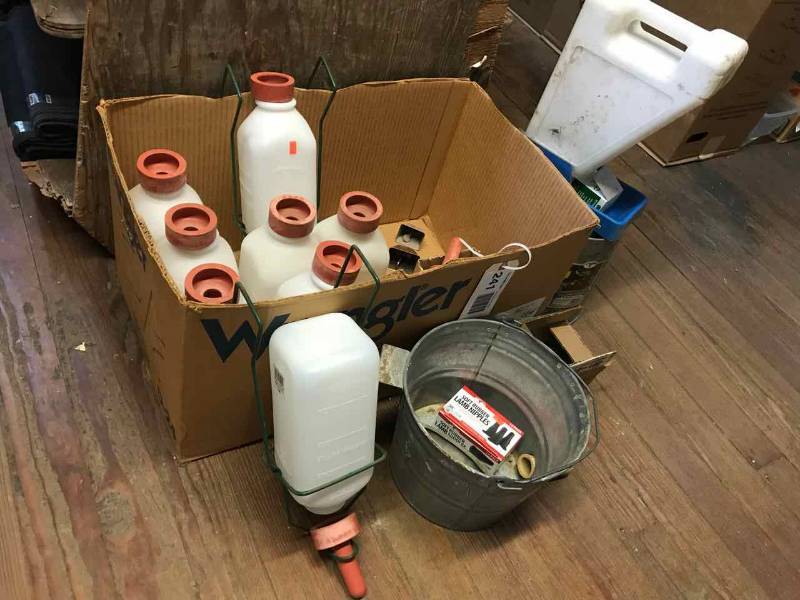 lot 241 image: Nursing Bottles, Nursing Bucket, Holders, Bells, Etc.