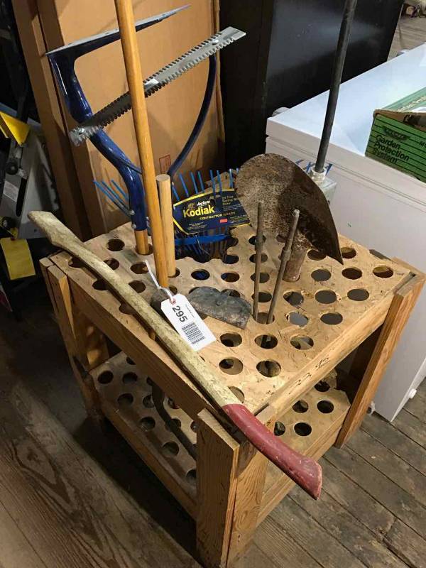 lot 295 image: Asst. Yard Tools Rake, Weed Eater, Shovel Head, Hoe Head, Axe Handle