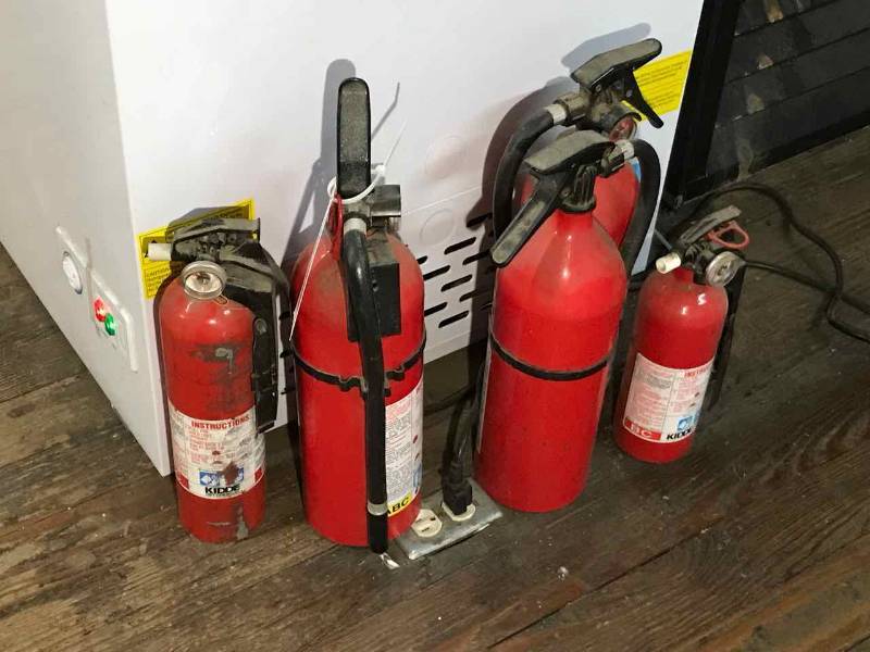 lot 298 image: (4) Fire Extinguishers (3 need charging, 1 shows charged)