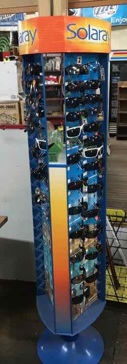 lot 299 image: Sunglasses and Revolving Displayer
