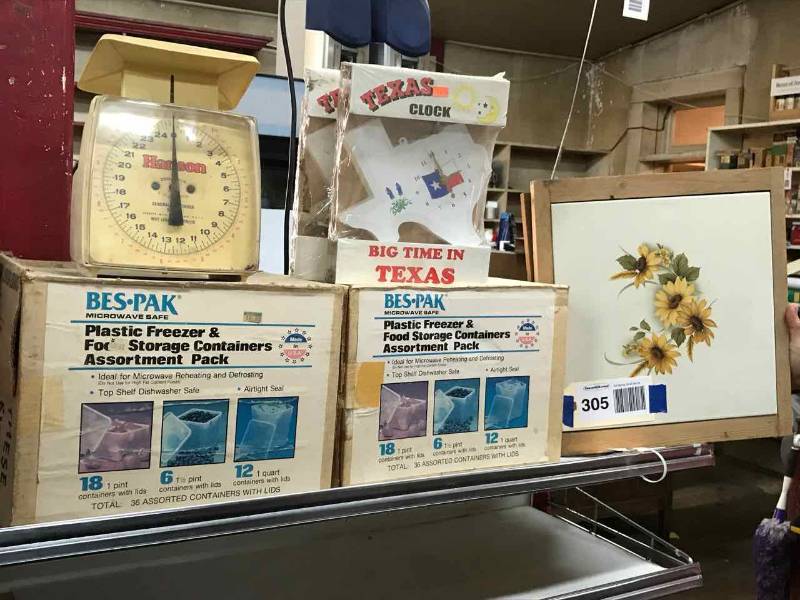 lot 305 image: Household Scale, (2) Boxes Food Storage Containers, (2) Texas Clocks, (2) Tile TrivetsCutting Boards
