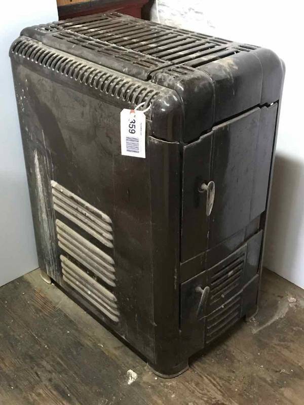 lot 359 image: (1) Old Enamel Wood Heater (used to heat Bergheim Store) Is Heavy