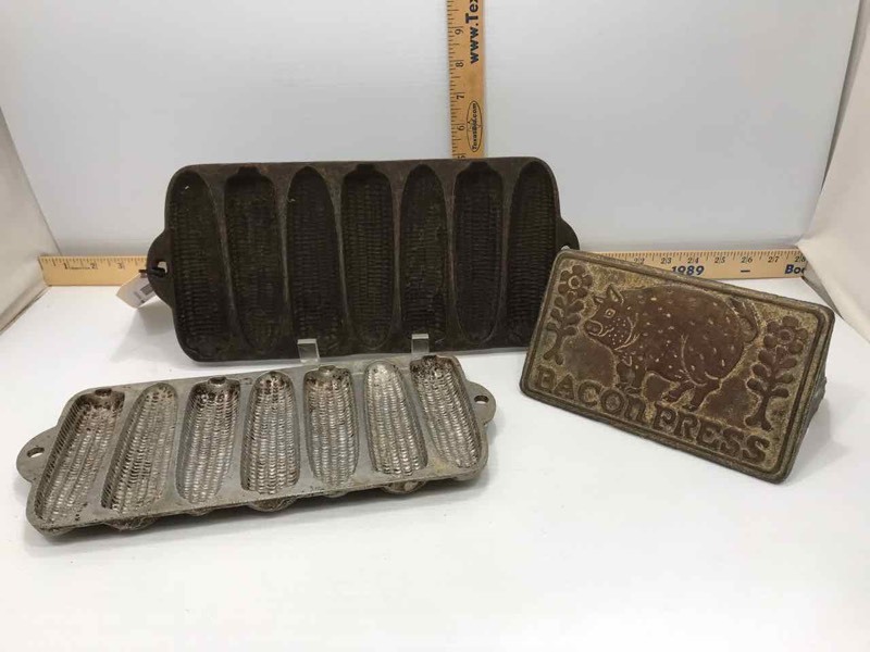 lot 60 image: (2) Cast Iron Corn Stick Pans, (1) Bacon Press