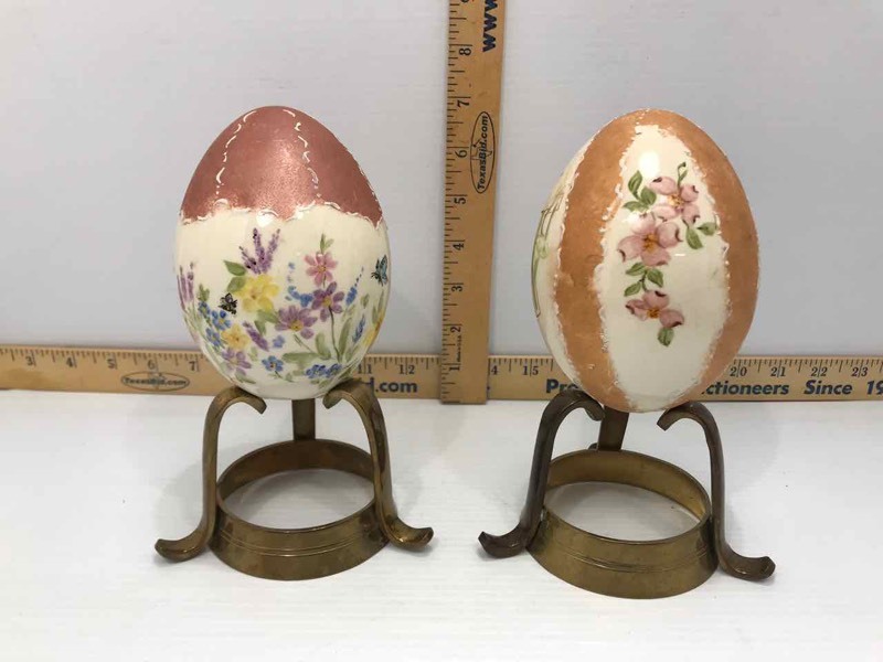 lot 130 image: (2) Painted Eggs on Brass Stands