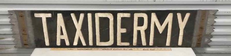 lot 402 image: Taxidermy Sign (wood, carved black wwhite letters)