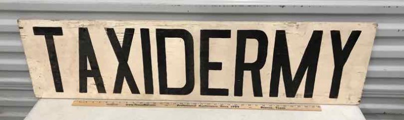 lot 403 image: Painted Wood Sign (Taxidermy) white wblack letters
