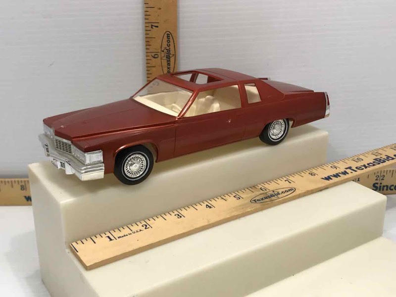 lot 601 image: Dealership Promo  Vintage Johan 1977 Cadillac 125 Scale Built Up Plastic (saffron)